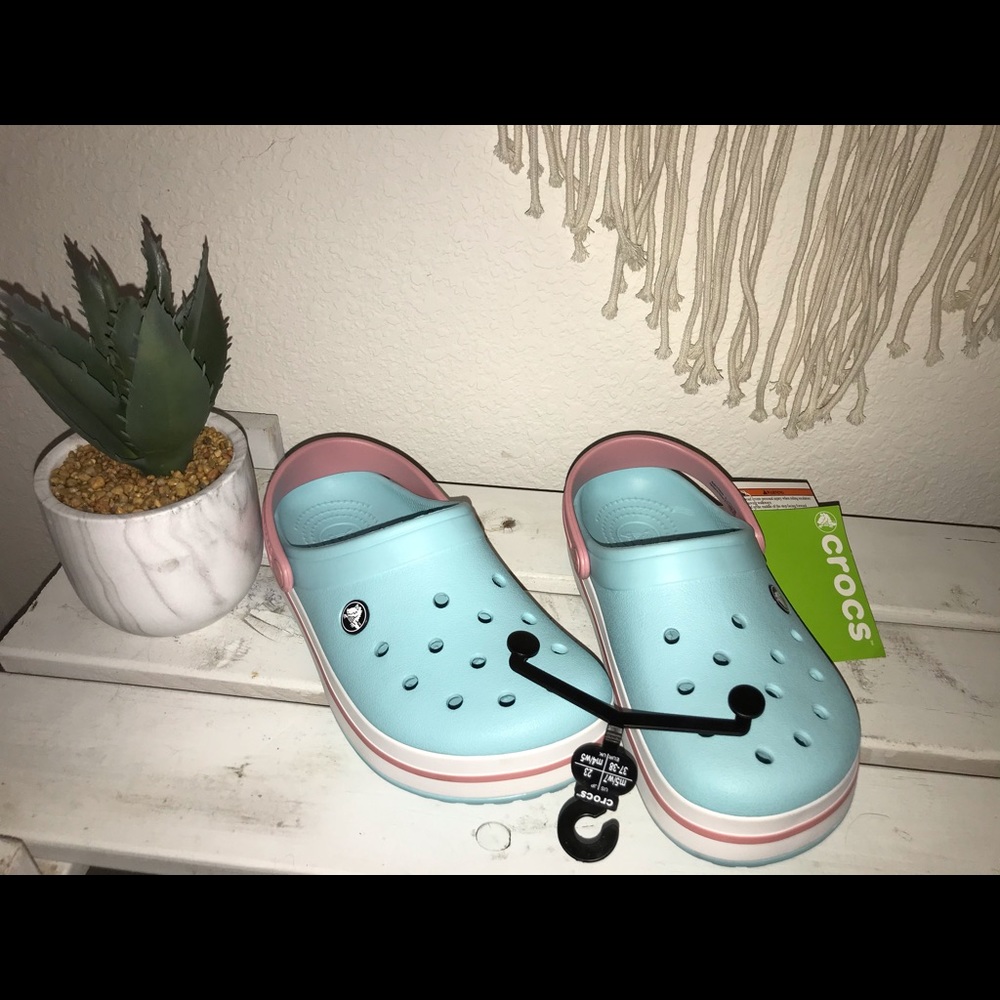 Light blue and pink Crocs
